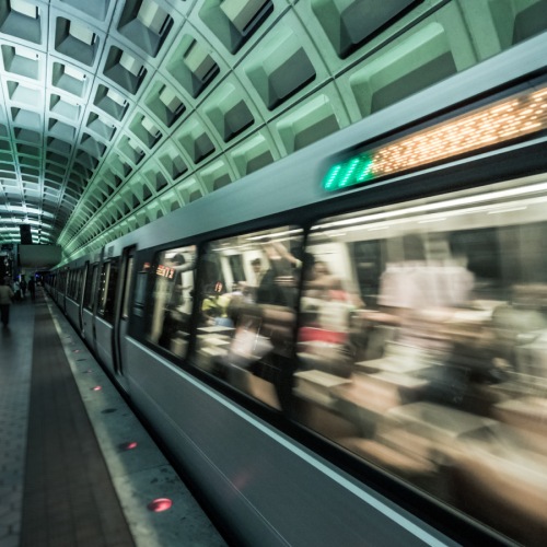 a subway with a train moving