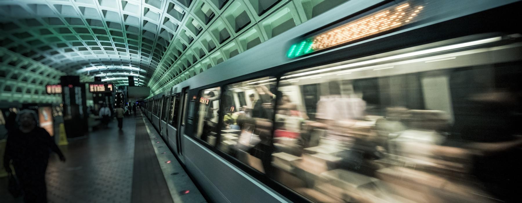 a train travels down the tracks